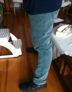 Full steel chastity belt securing a 4&quot; Steel Rattler Butt Plug, 85mm Penis plug in penis tube, Docs and Skinny jeans.